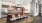 kitchen with a bar and chairs
