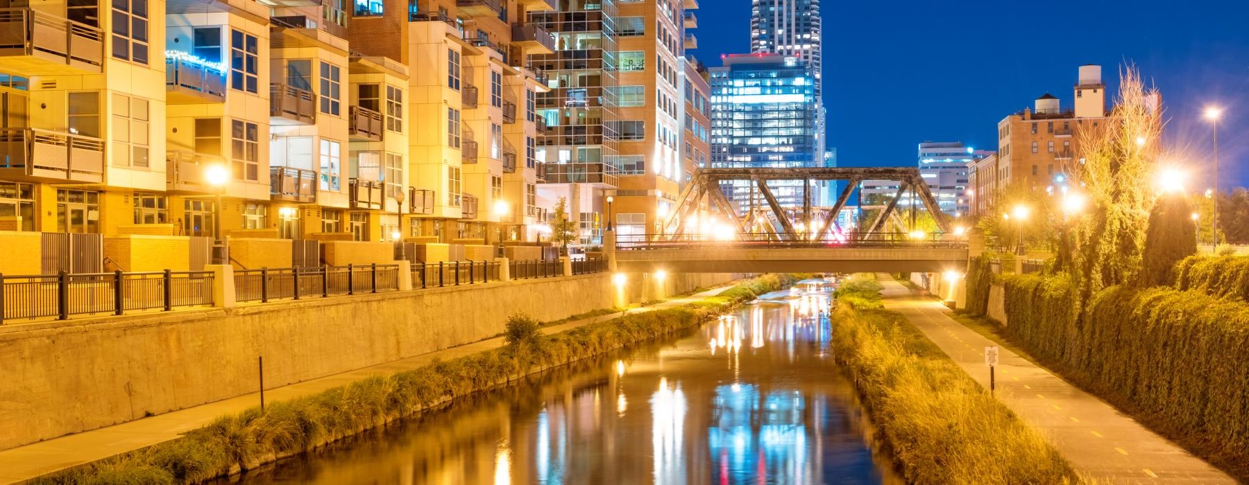 a river with buildings along it